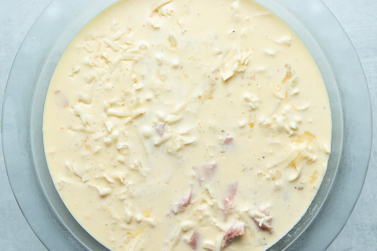 a pie plate with all the ingredients prior to oven bake. 