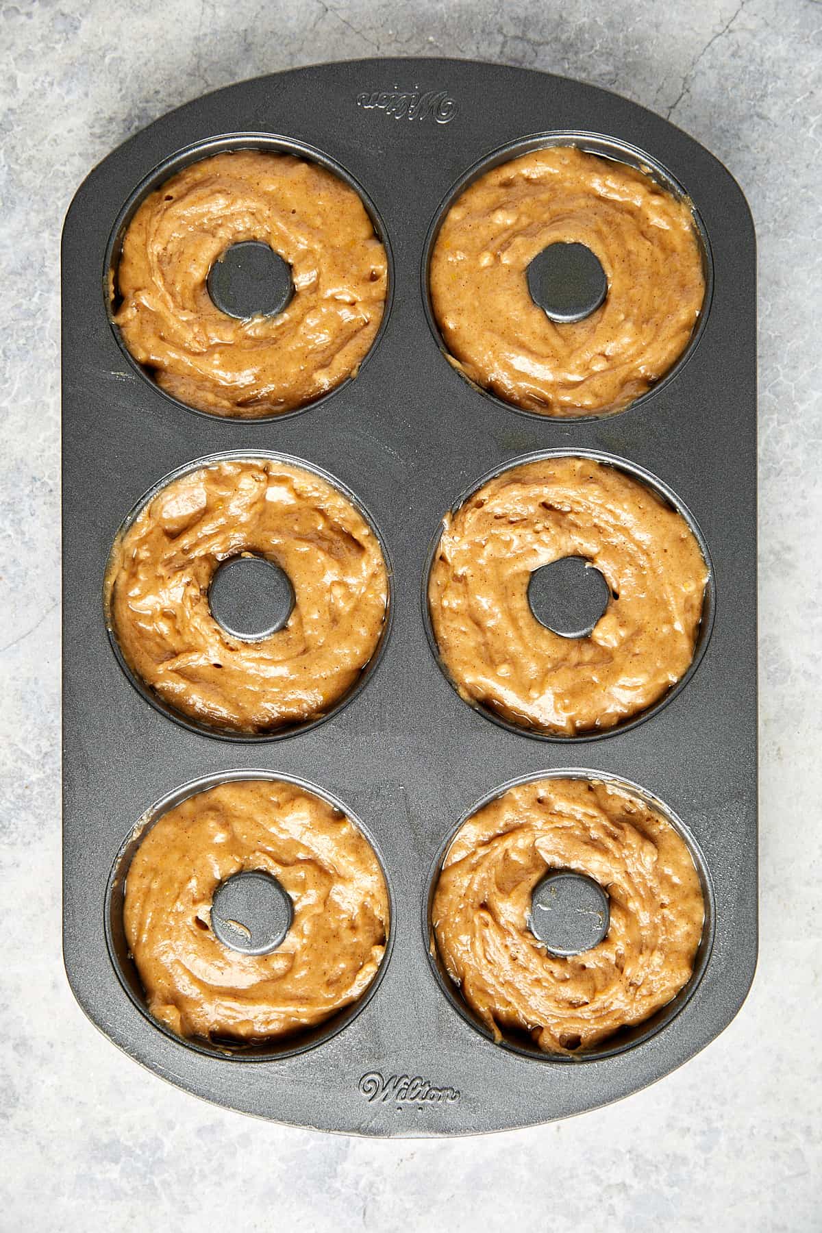 batter in a donut pan