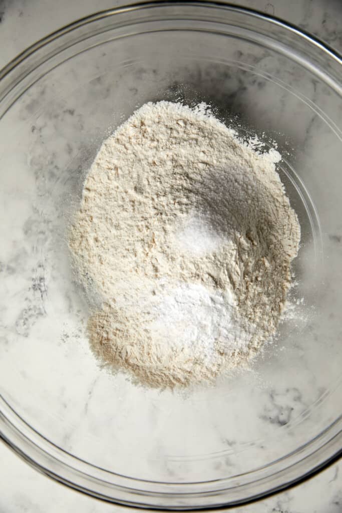 dry ingredients piled in glass bowl.