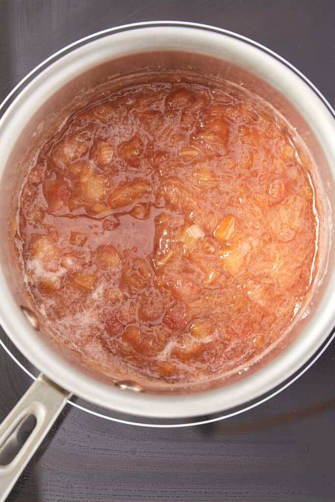 overheard view of rhubarb cooked down in saucepan.