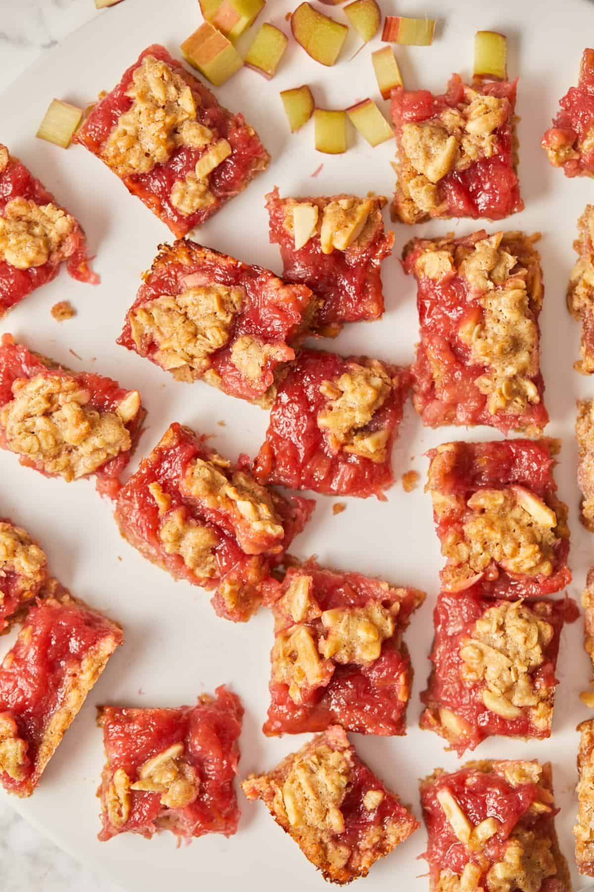 overhead view of several baked rhubarb bar squares.