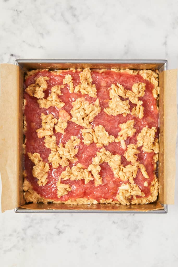 overhead view of the rhubarb oatmeal bars with the topping on it prior to baking.