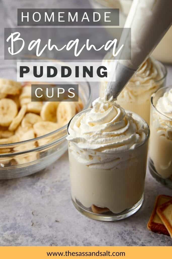 Close up view of homemade banana pudding cups with whipped cream on top.