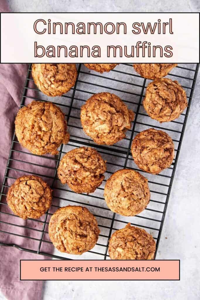 cinnamon swirl banana muffins baked and sitting on a cooling rack.