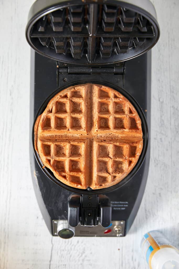 Overhead view of Nutella waffle cooked in a waffle maker.