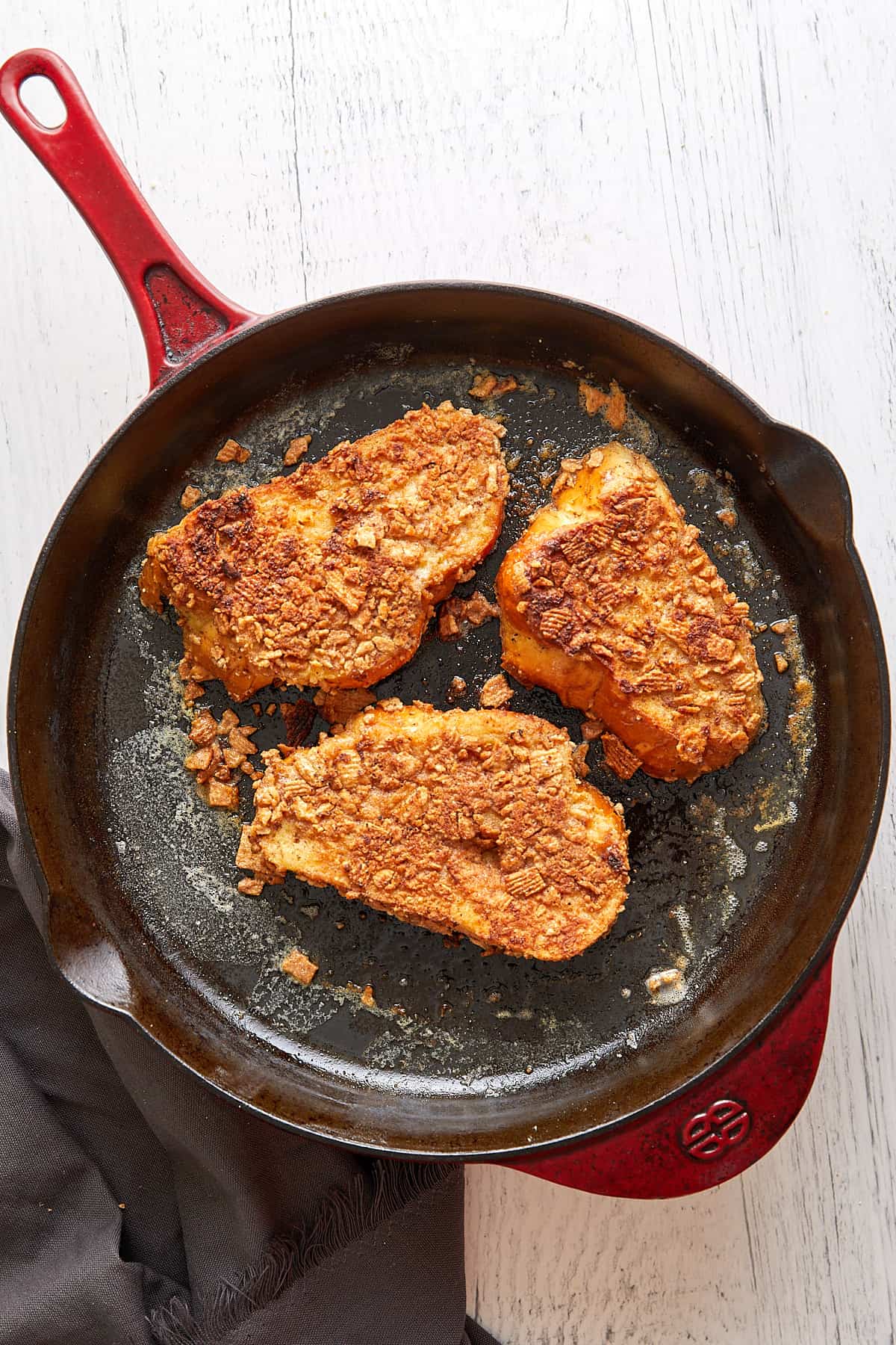 Cinnamon toast crunch in an enameled cast iron pan.