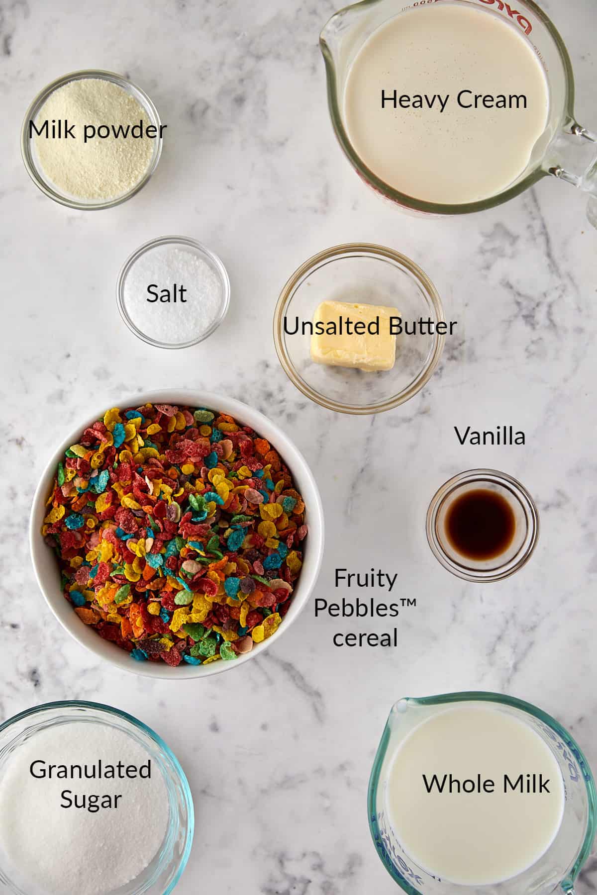 Overhead view of fruity pebbles ice cream ingredients. 