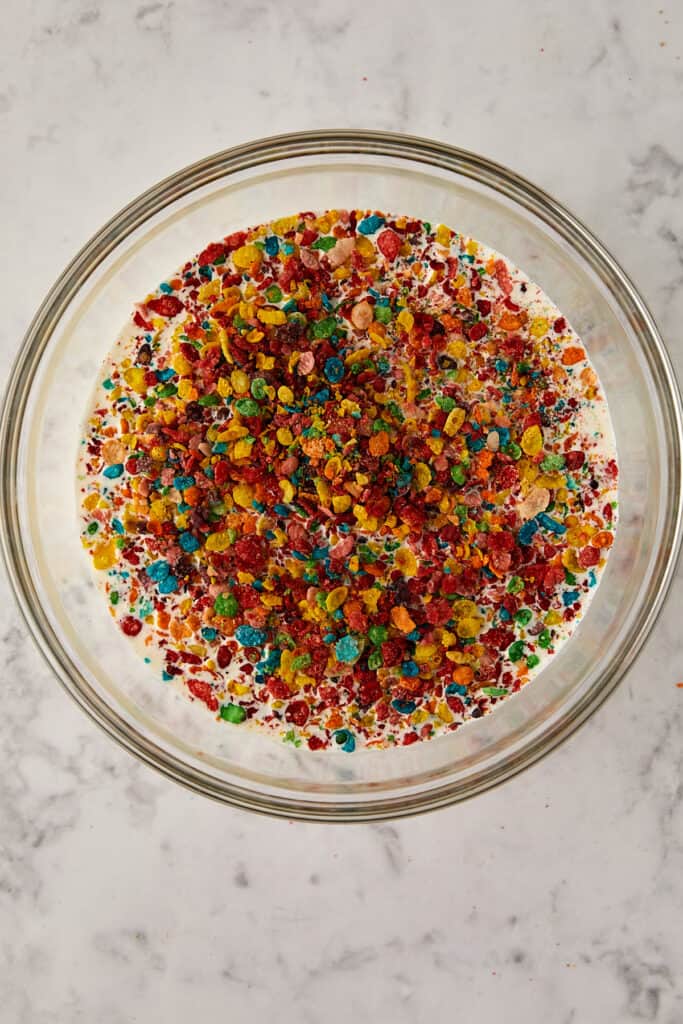 Fruity Pebble sitting on top of milk.