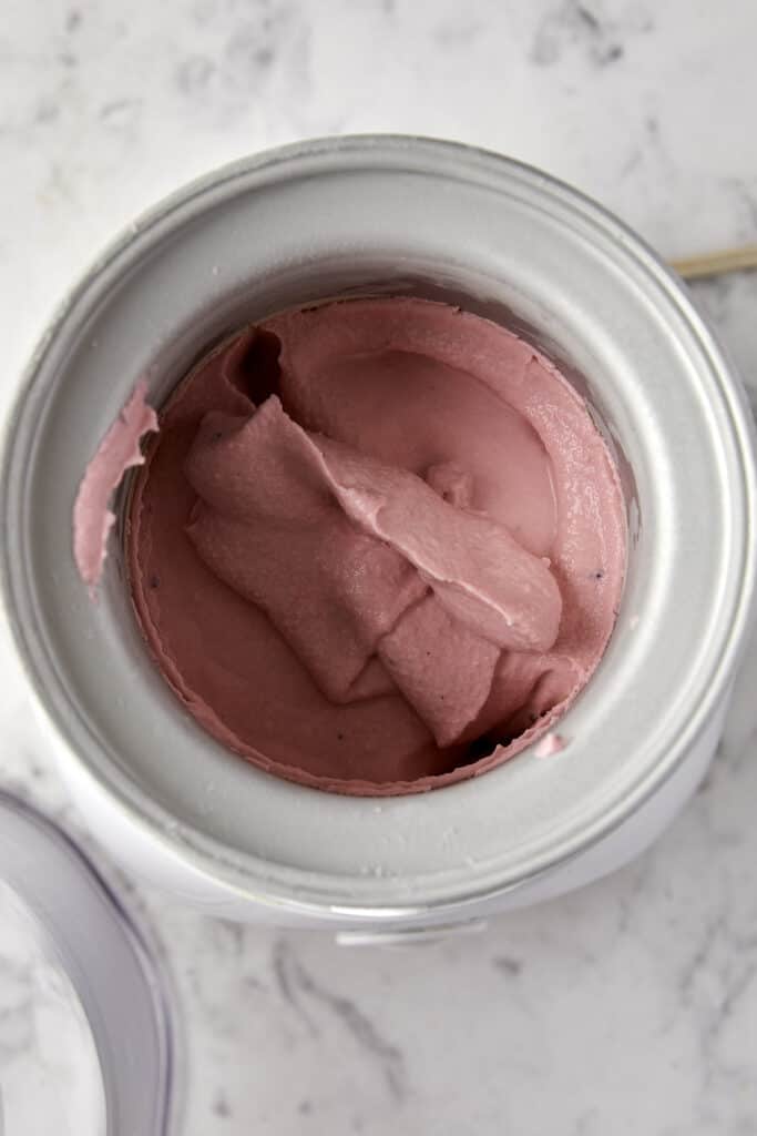 Fruity pebble ice cream in the ice cream maker.