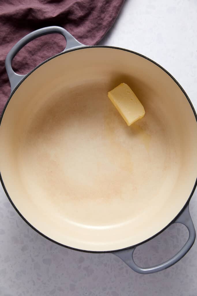 Four tablespoons of butter in dutch oven.