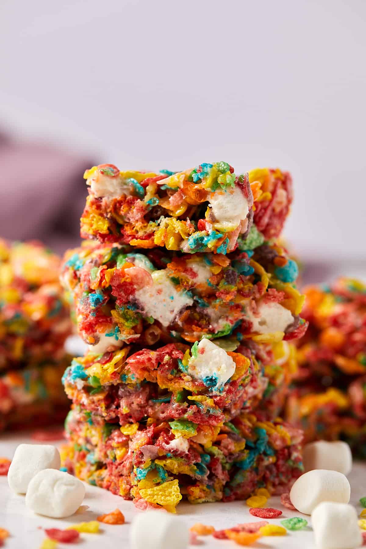 A close up view of a stack of Fruity Pebbles Marshmallow treats.