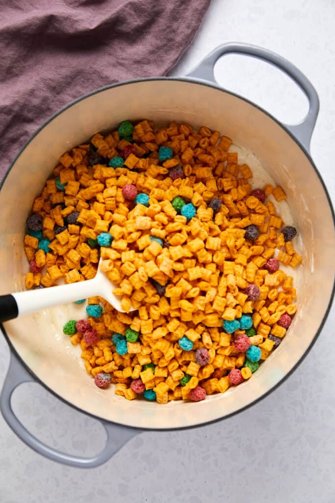 Overhead view of Captain Crunch poured on top of melted marshmallows.