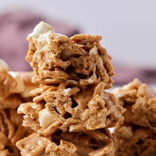 Close up view of a stack of cinnamon toast crunch marshmallow treats.