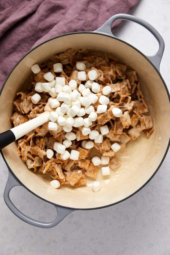 Overhead view of marshmallows on top of cinnamon toast crunch. 