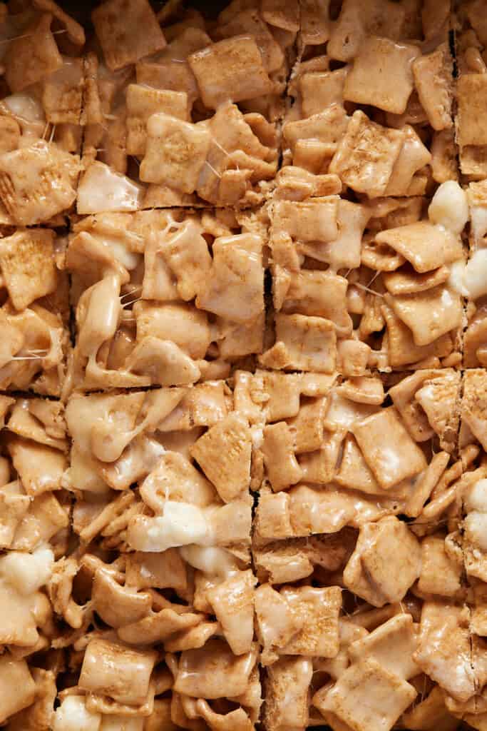 Close up view of cinnamon toast crunch marshmallow treats cunt in pan. 