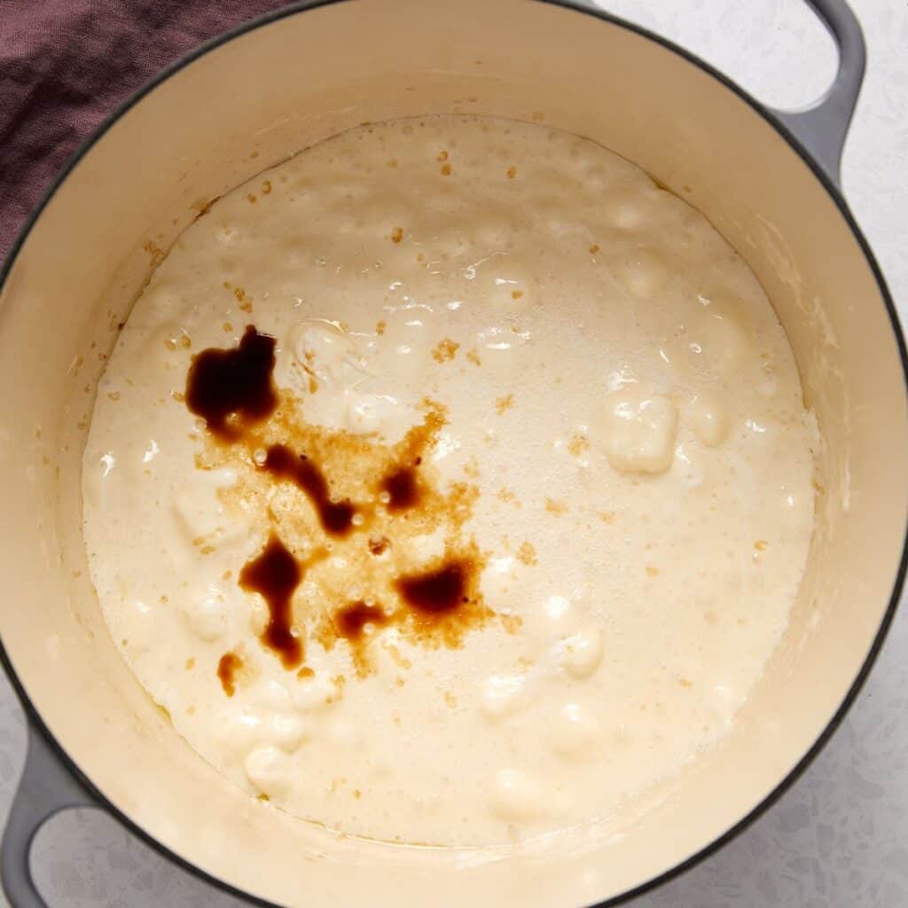 Mini marshmallows melting into butter for Cap'n Crunch treats.

