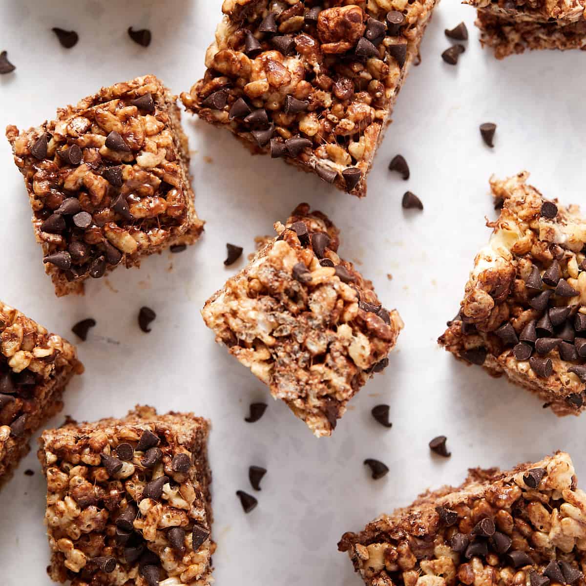 Overhead view of Chocolate Chip Rice Krispie treats cut into square pieces.