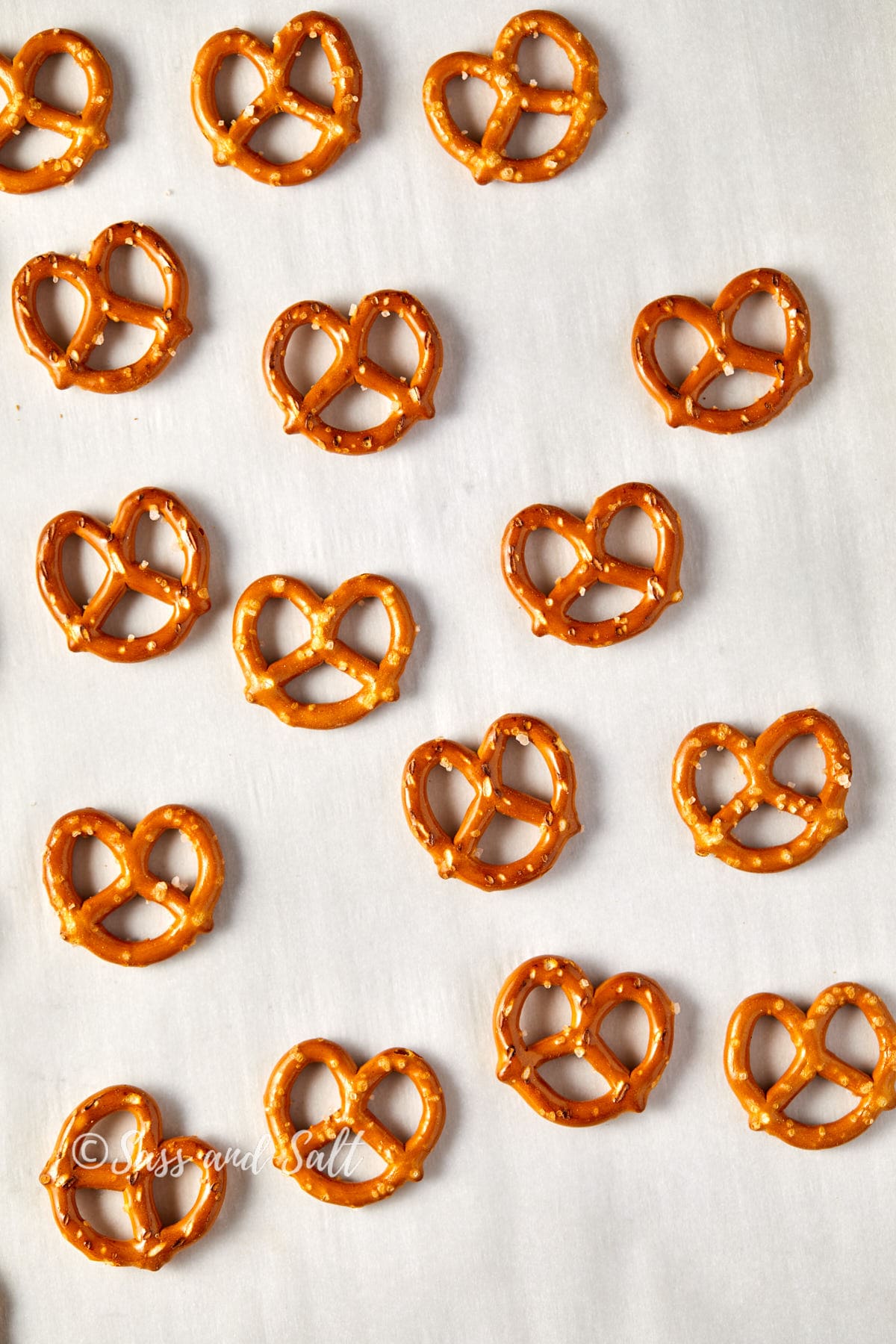Overhead view of plain pretzels on a counter.