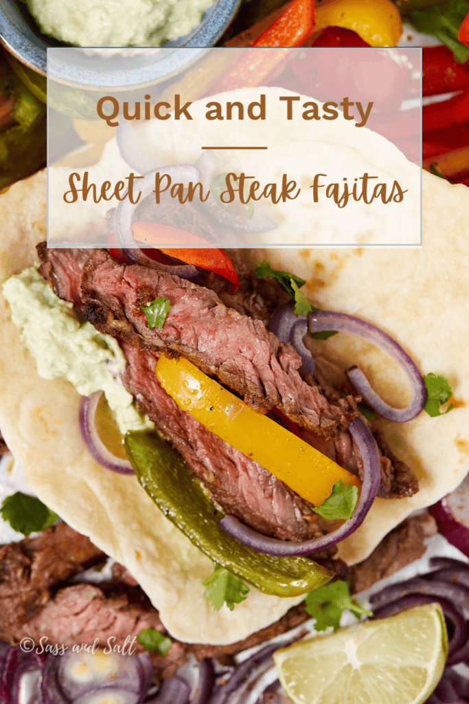 A close-up of a sheet pan steak fajita on a tortilla, topped with slices of steak, red and yellow bell peppers, red onions, and guacamole. Lime wedges are visible in the background. Text at the top reads "Quick and Tasty Sheet Pan Steak Fajitas.