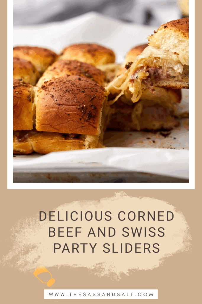 A close-up of golden-brown corned beef and Swiss cheese sliders on a tray, with one slider being pulled away, showing melted cheese and meat. The text reads “Delicious Corned Beef and Swiss Party Sliders.”.