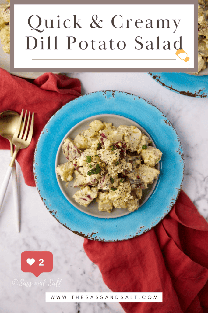 A plate of creamy dill potato salad is served on a blue-rimmed dish, placed on a marble surface with a red napkin, fork, and spoon. Text above reads "Quick & Creamy Dill Potato Salad.