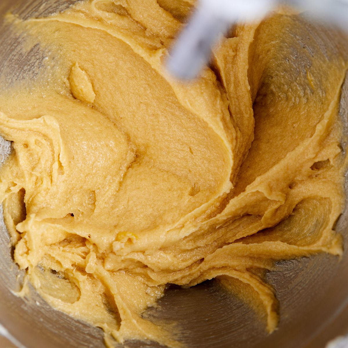 Egg, yolk, and vanilla beaten into the cookie dough.
