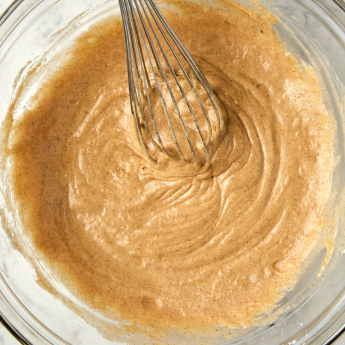 Apple cider donut loaf cake batter mixed.